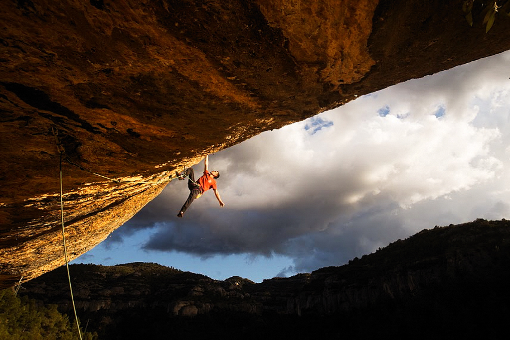 Will Bosi climbing First Ley (F9a+) at Margalef. Photo: Jake Thompson/Band of Birds